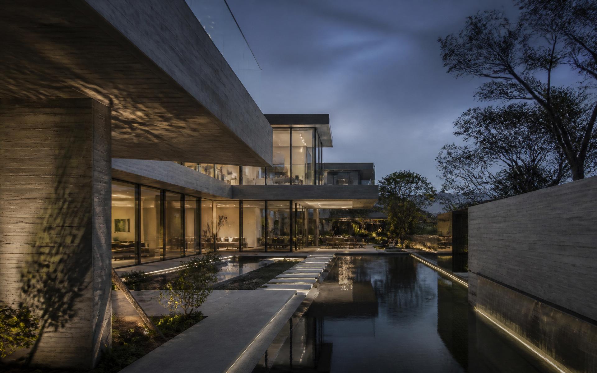 Atlas Developments studio concept — luxury residential development at dusk